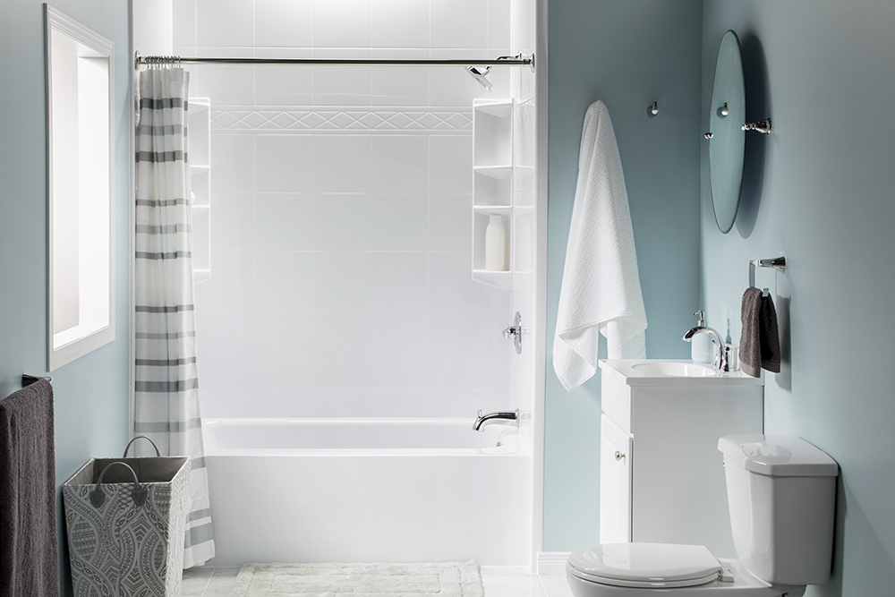 A clean, modern bathroom with a tub.